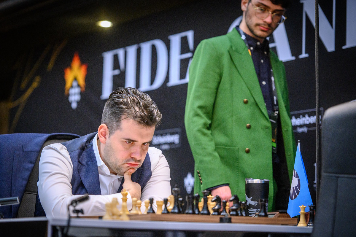 Ян Непомнящий и Алиреза Фирузджа | Фото: FIDE / Michal Walusza